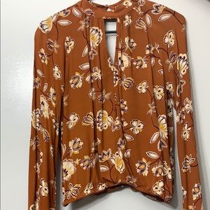 Orange floral blouse